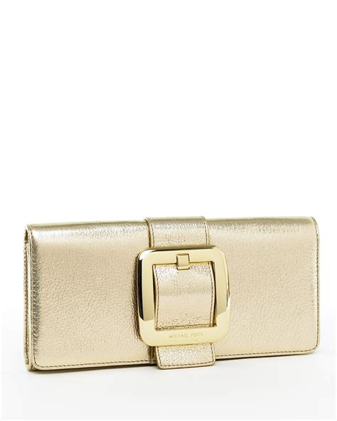 michael kors sutton clutch gold|Michael Kors clutch outlet.